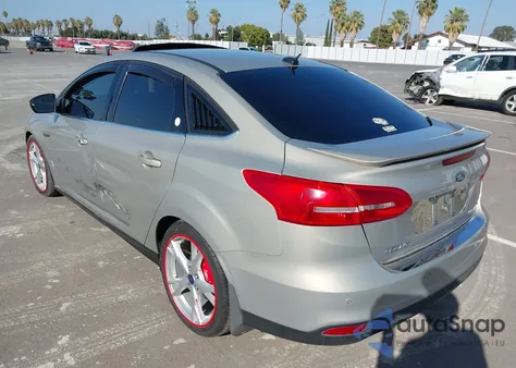 2015 Ford Focus Titanium from USA, damaged, VIN 1FADP3J26FL341446